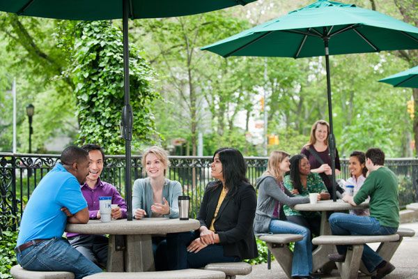 Residents talk on the O'Neill Patio.